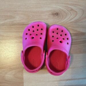 Pink crocs